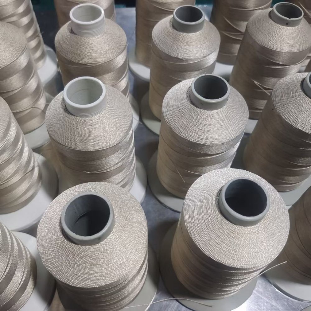 Filo da cucito in fibra di vetro rivestito in PTFE: dimensione dell'ago, tensione e rottura
